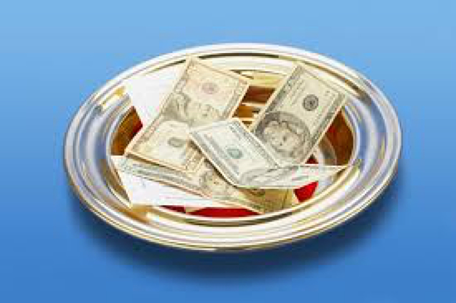 collection plate with credit cards in it